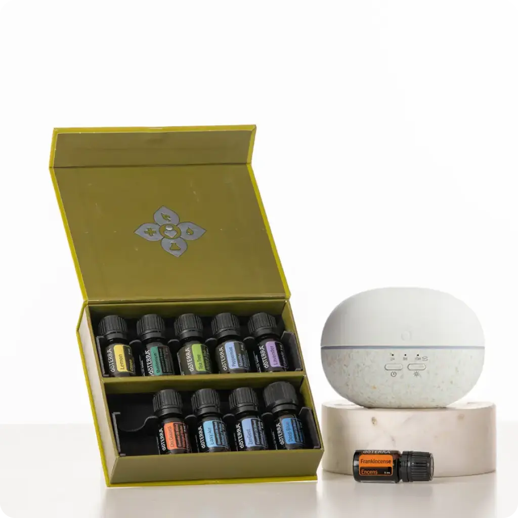 Illóolaj készlet dobozban és diffúzor fehér háttéren